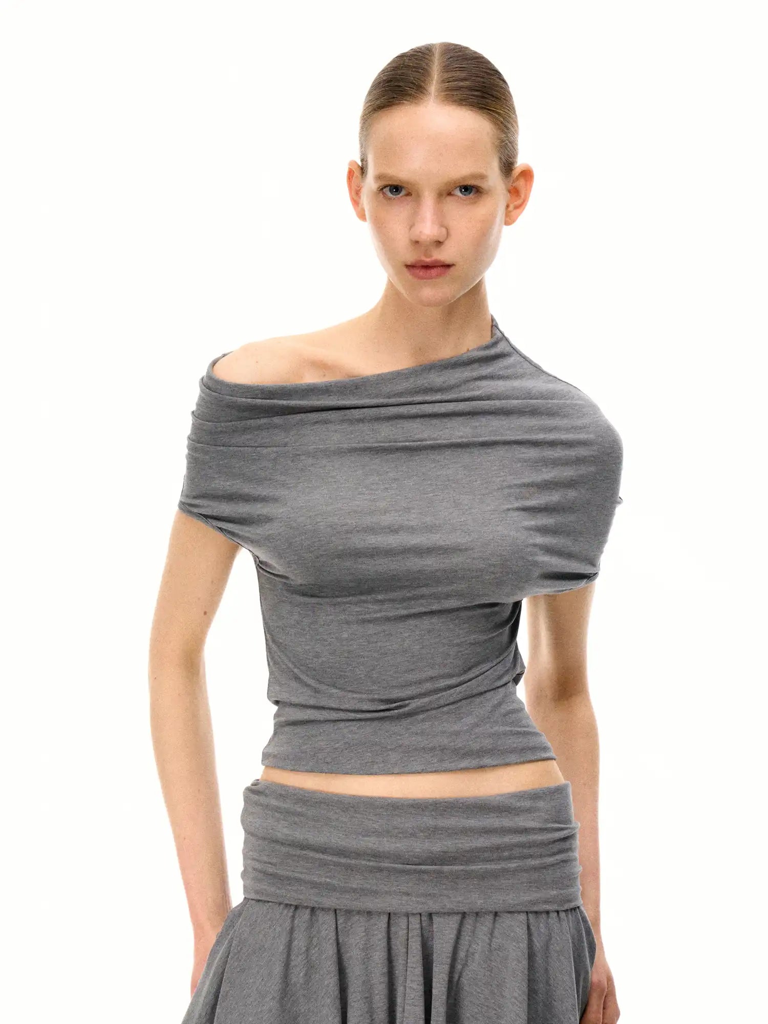 FirstFloor Asymmetrical Neckline Short Sleeve Top With Ruched Detail | Canton Collective
