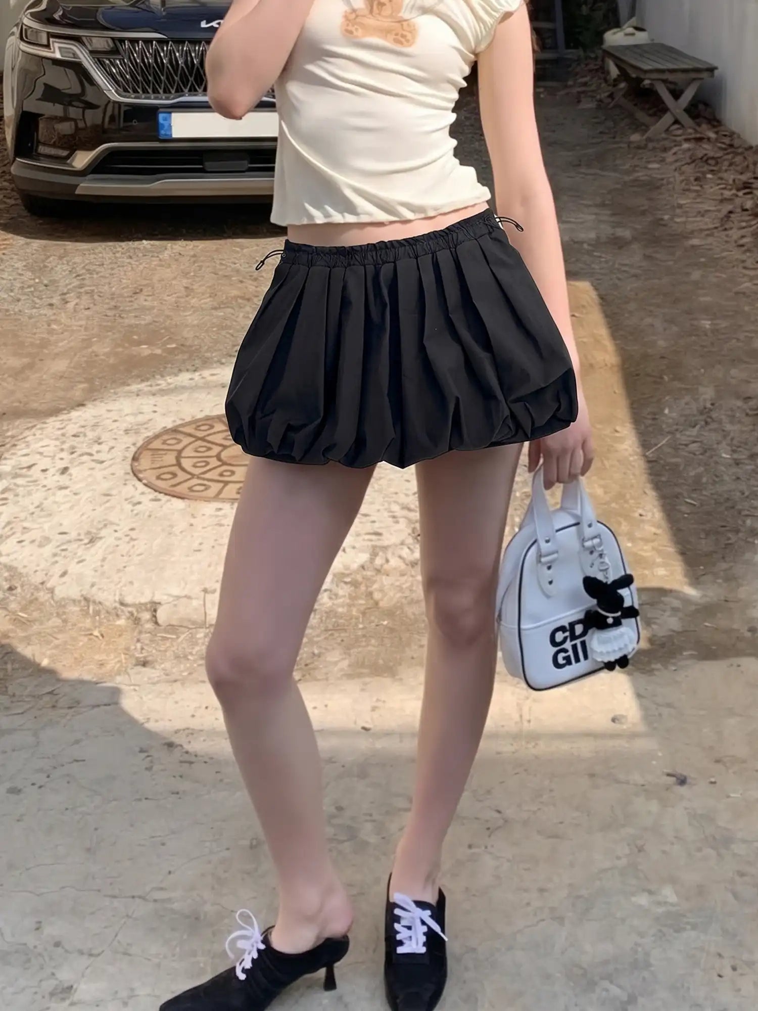 CantonCollective Design High-Waist Bubble Mini Skirt with Drawstring Detail | Canton Collective