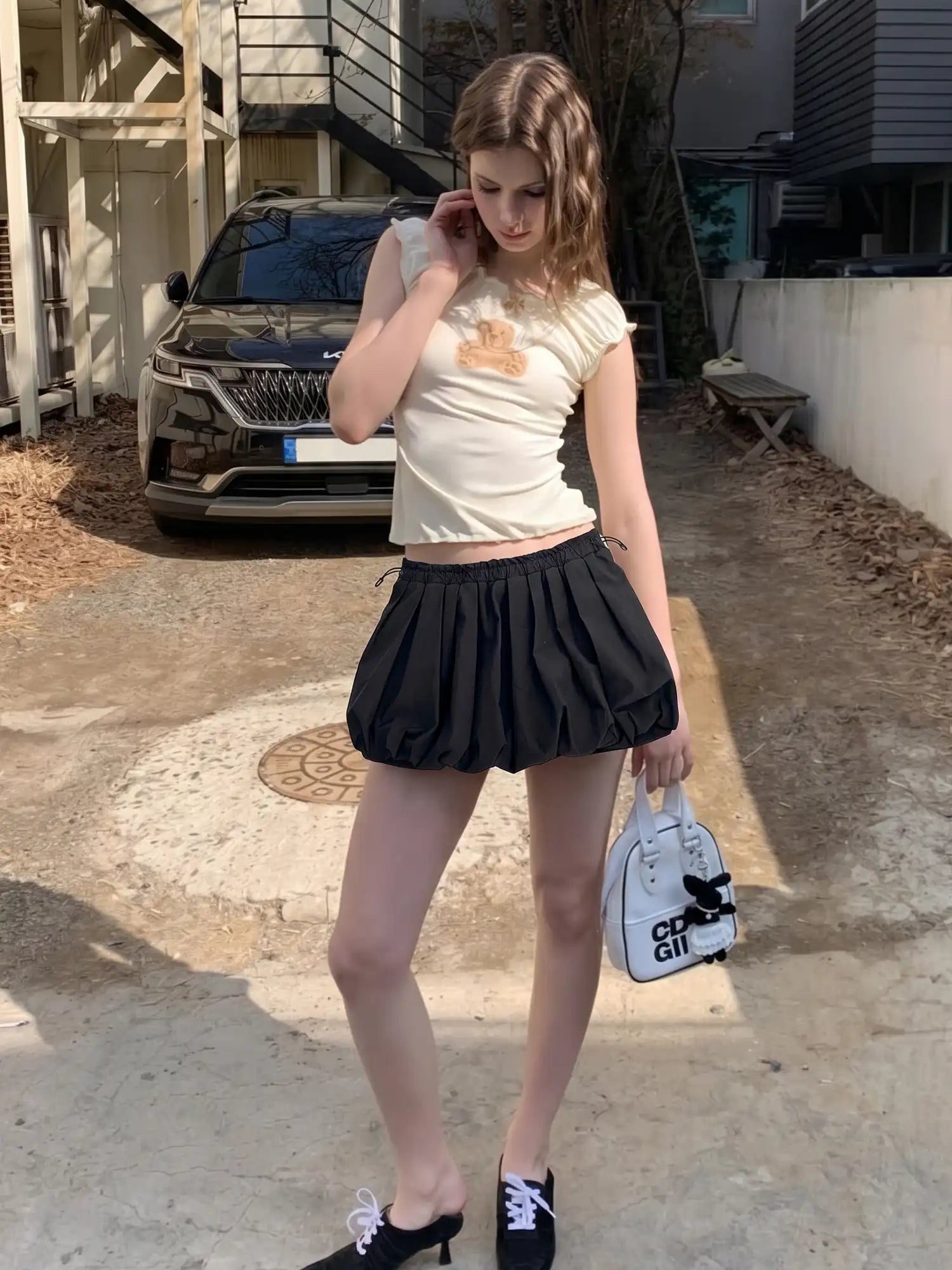 CantonCollective Design High-Waist Bubble Mini Skirt with Drawstring Detail | Canton Collective