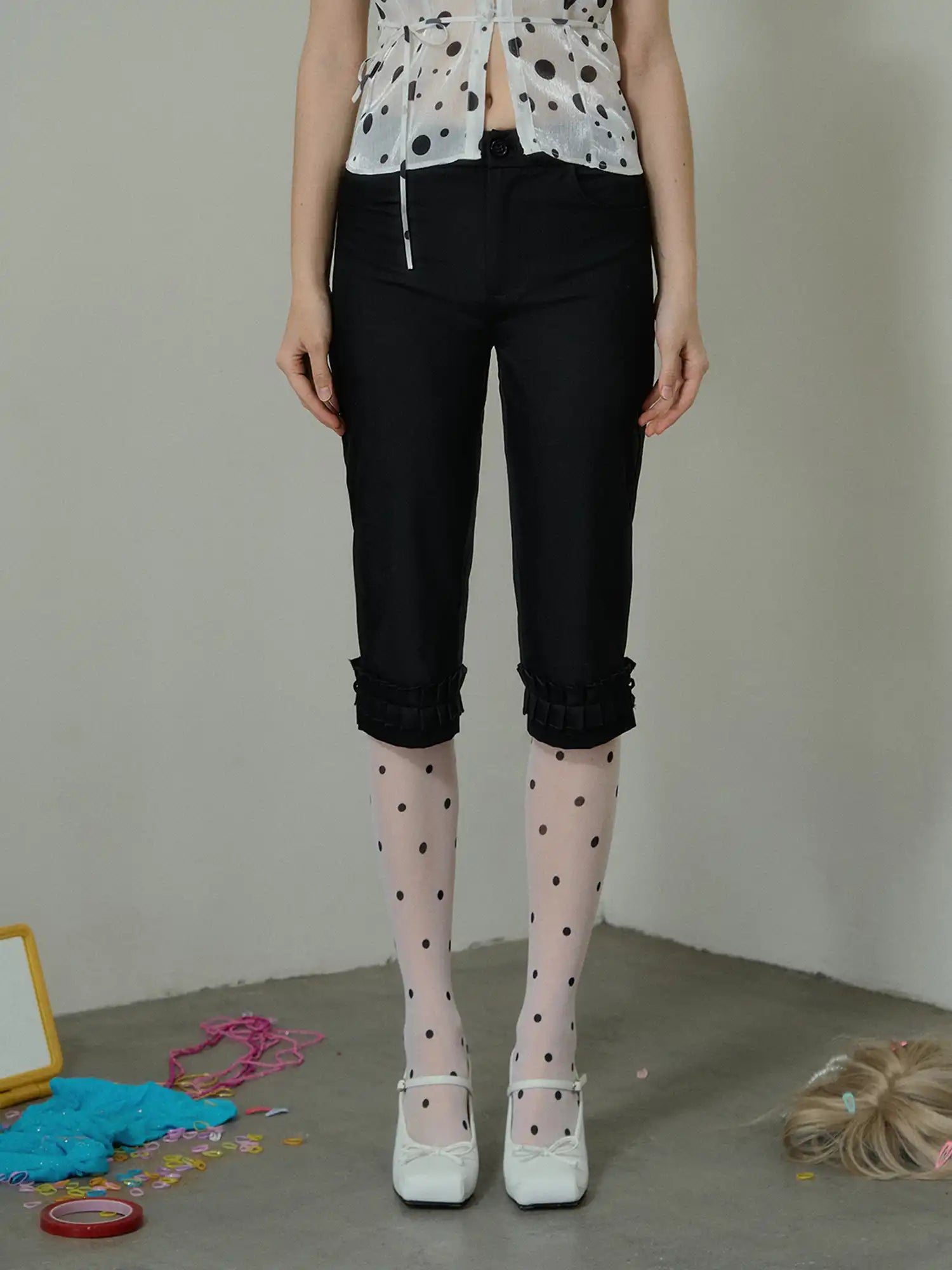 Deleteex Ruffle Hem Cuff Black Capri Pants | Canton Collective