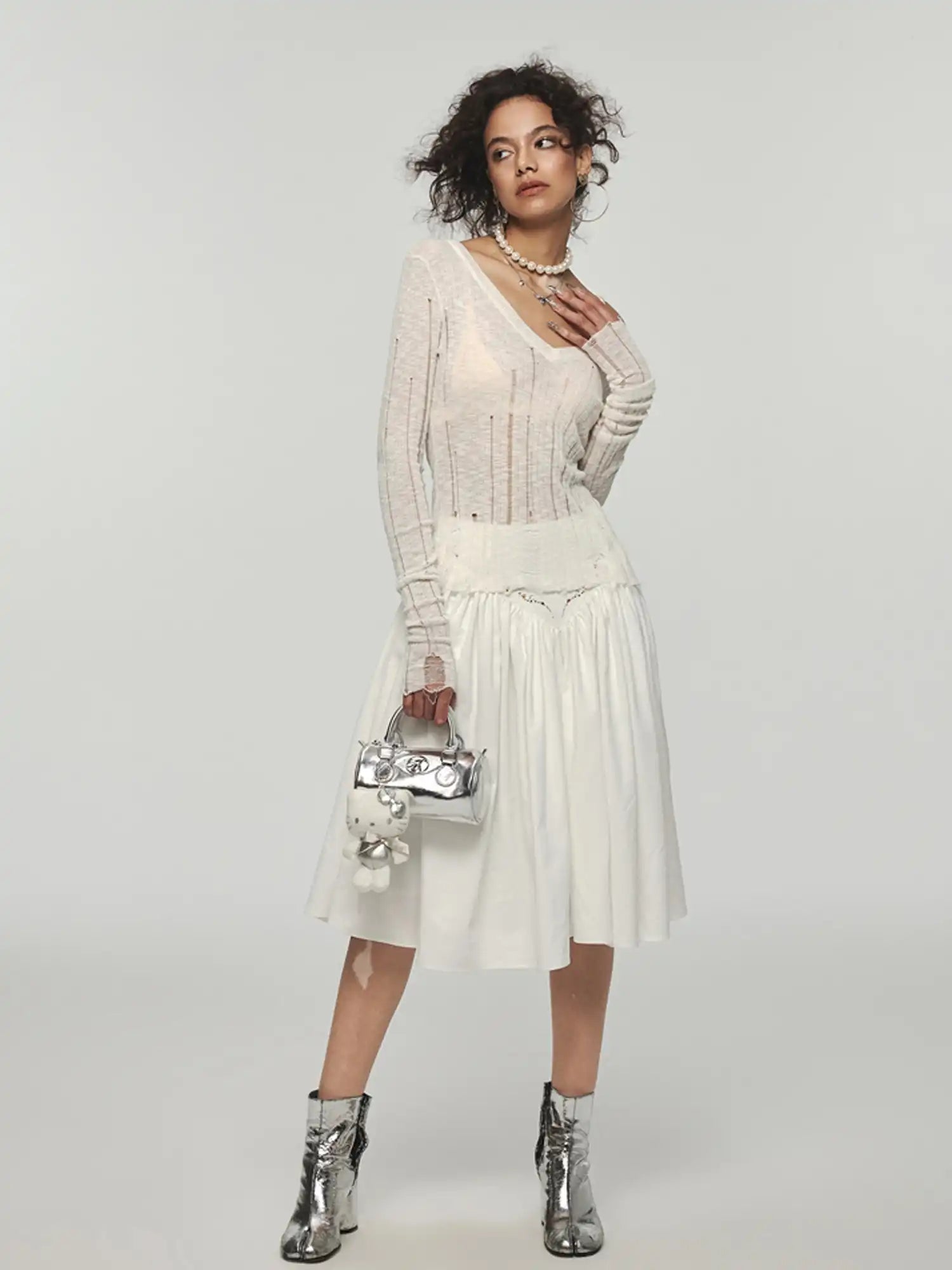 1Jinn Studio Torn Lines Knit Top | Canton Collective