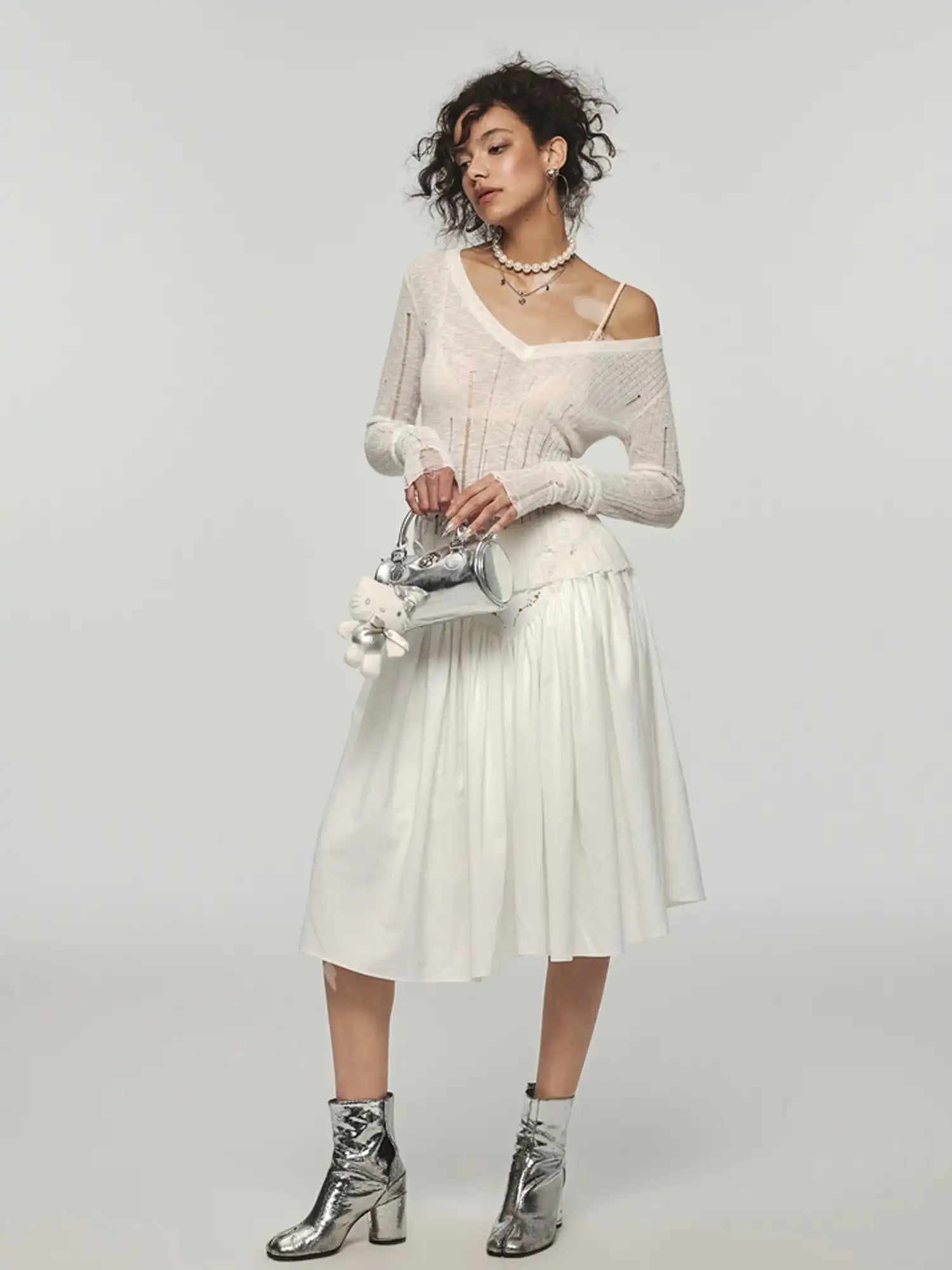 1Jinn Studio Torn Lines Knit Top | Canton Collective