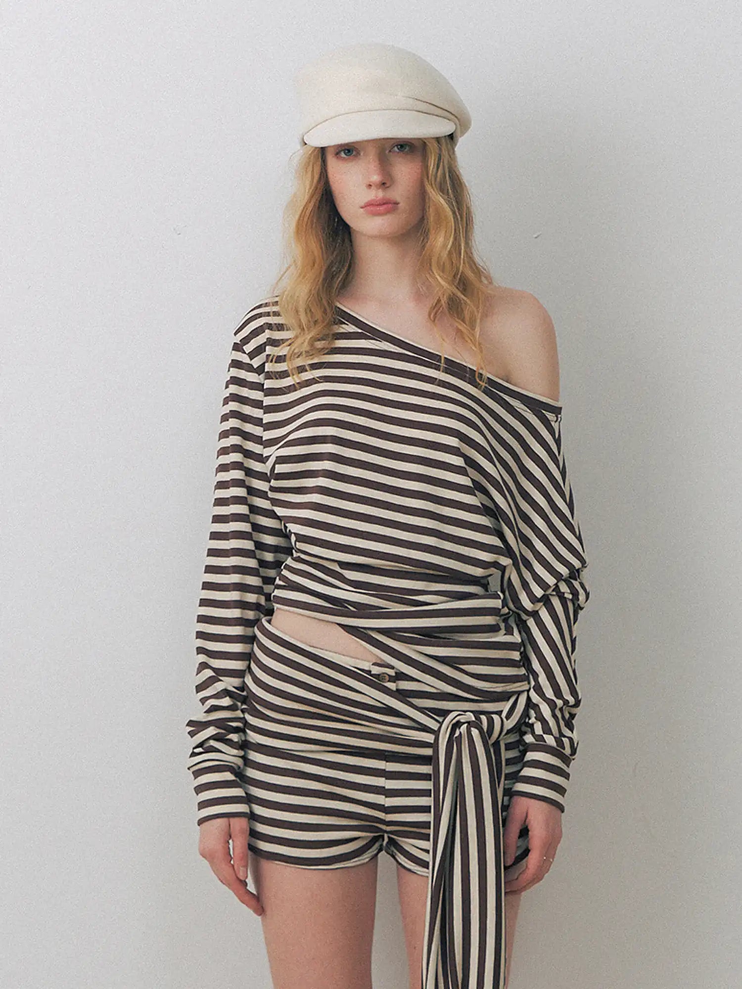 Deleteex Asymmetric Waist Twist Stripe Knit Blouse | Canton Collective