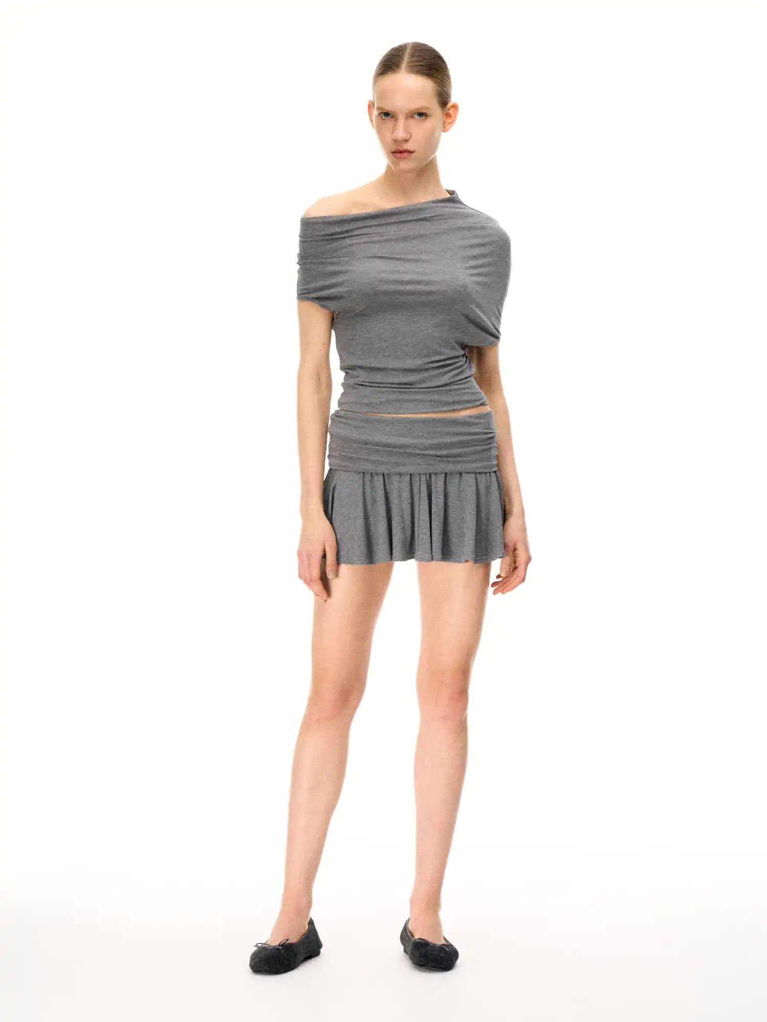 FirstFloor Asymmetrical Neckline Short Sleeve Top With Ruched Detail | Canton Collective