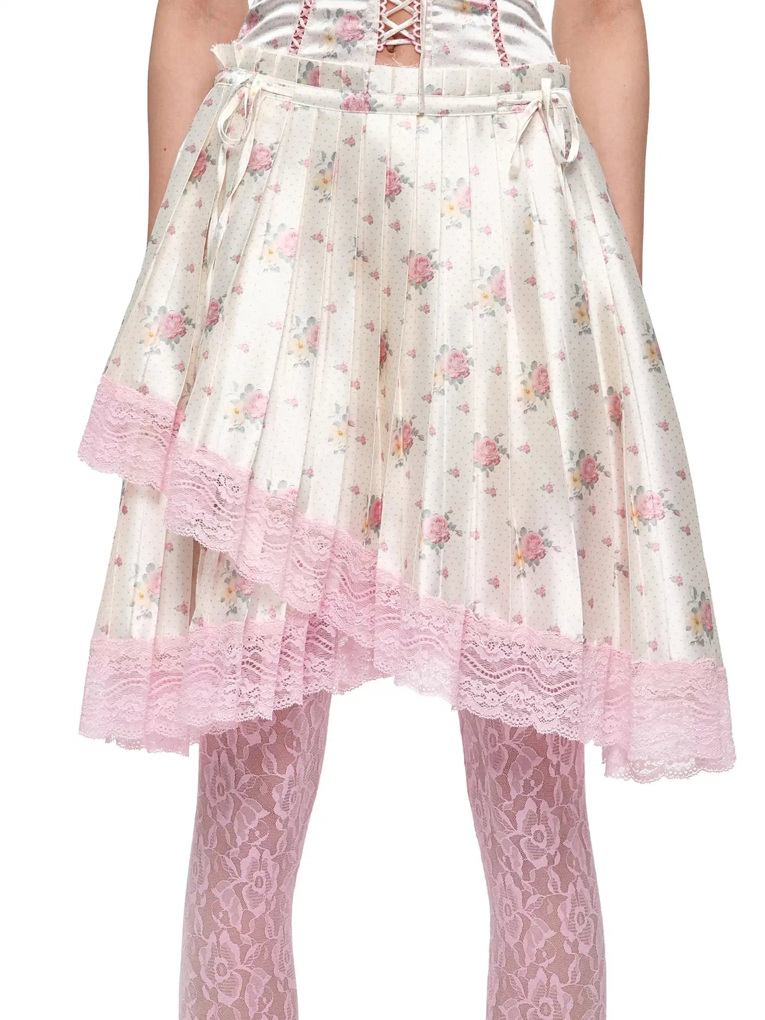 1Jinn Studio Lace Trim Asymmetric Hem Bow Waist Pleated Skirt | Canton Collective