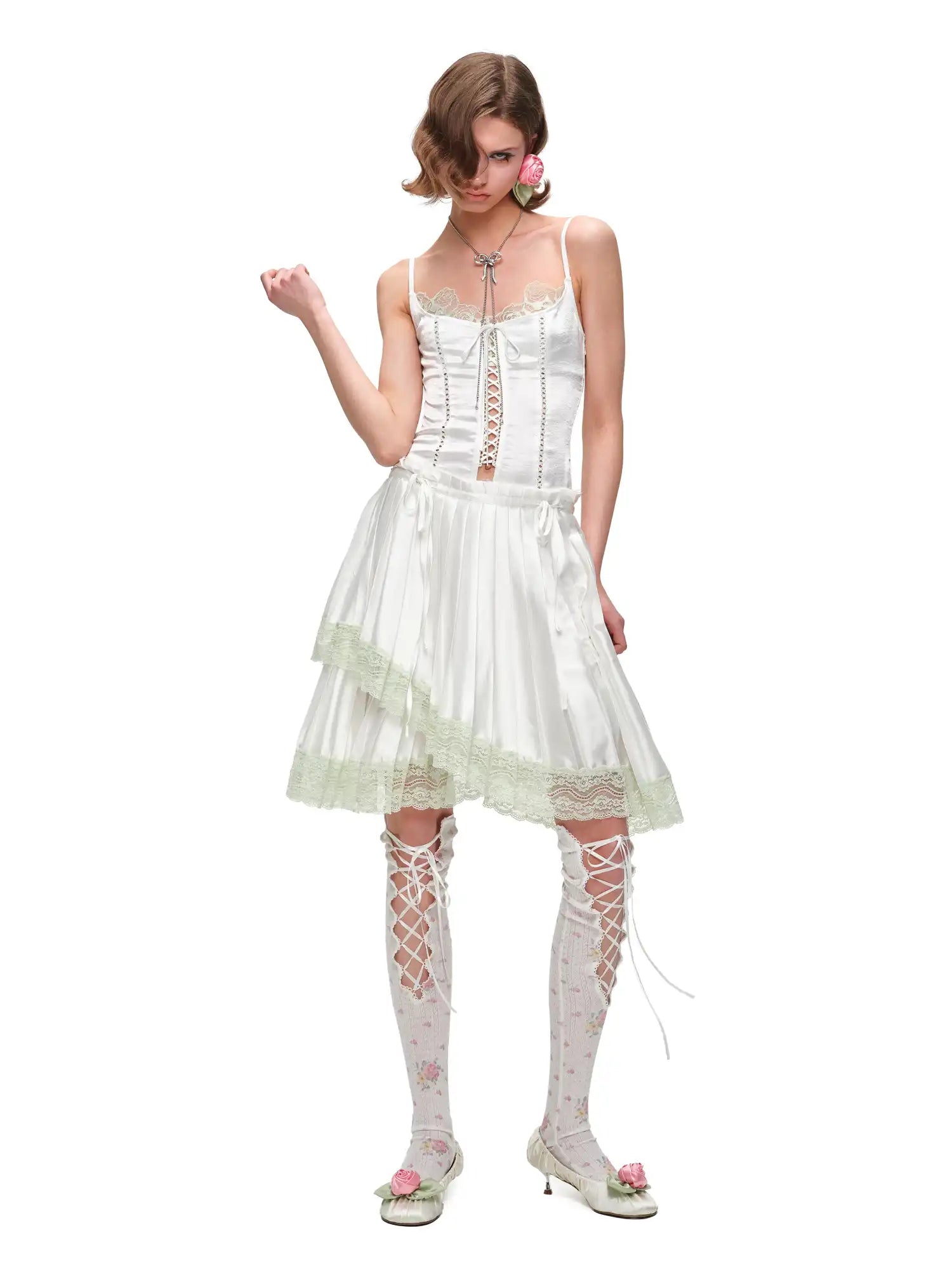 1Jinn Studio Lace Trim Asymmetric Hem Bow Waist Pleated Skirt | Canton Collective