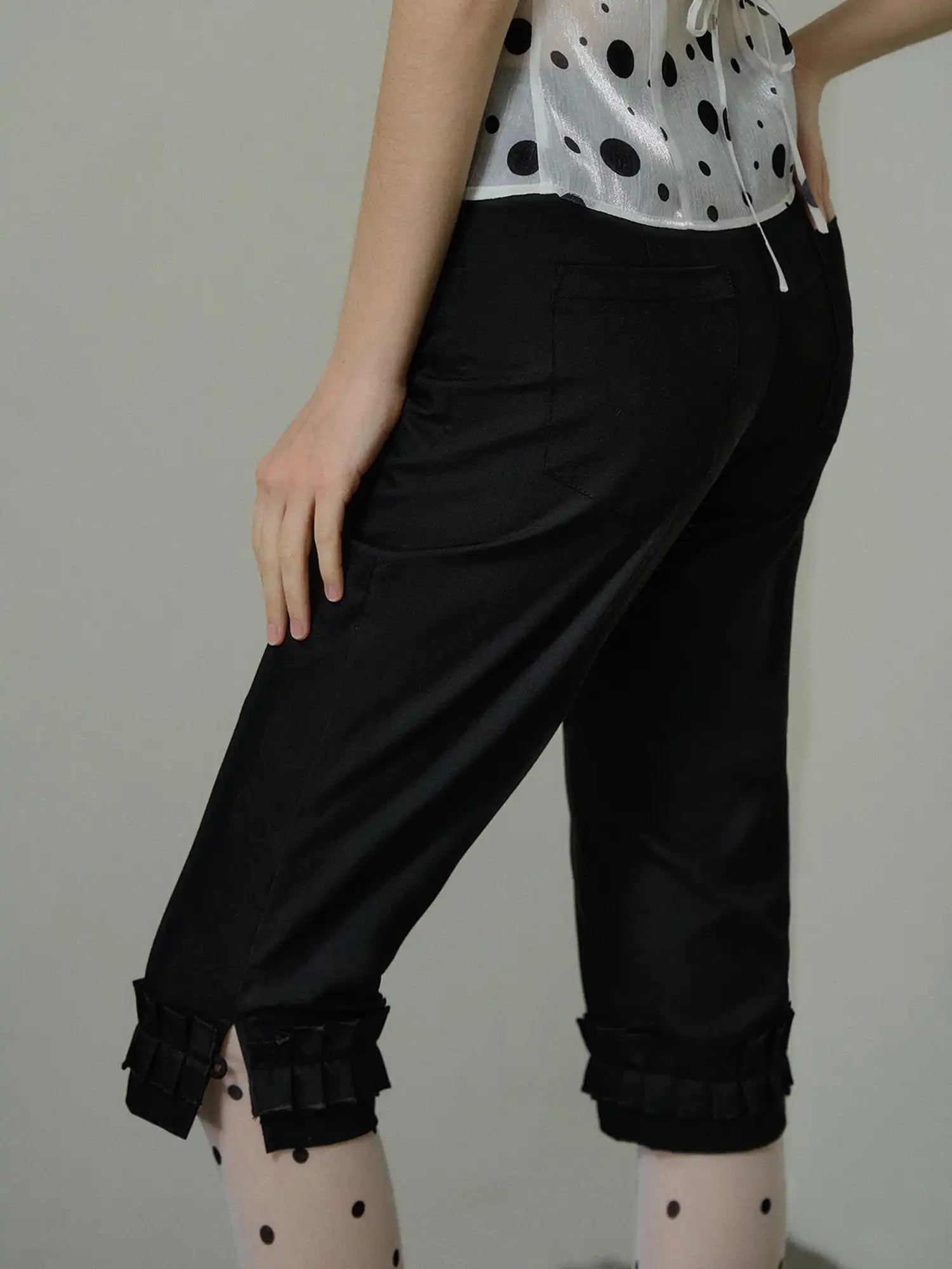 Deleteex Ruffle Hem Cuff Black Capri Pants | Canton Collective