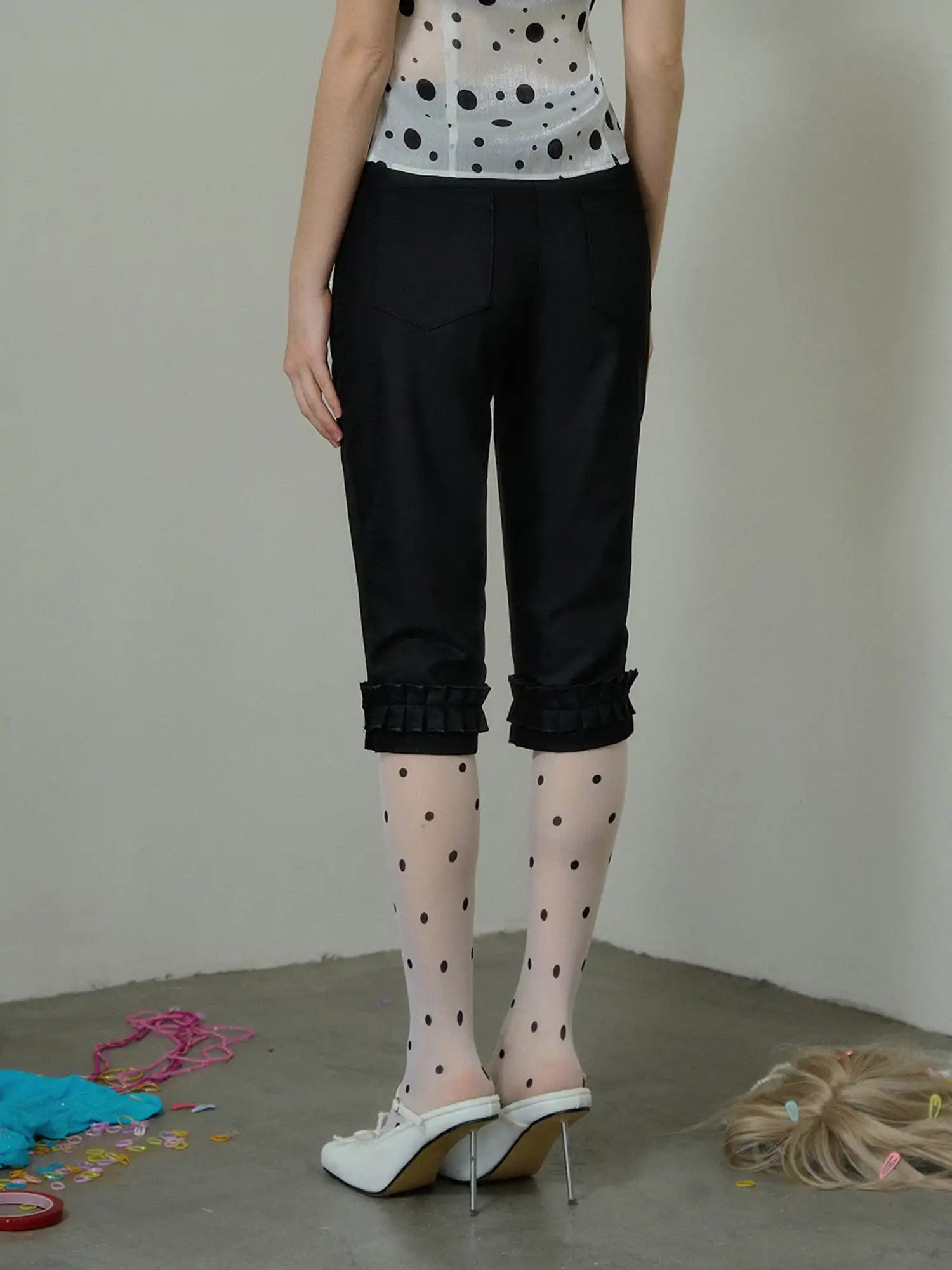 Deleteex Ruffle Hem Cuff Black Capri Pants | Canton Collective