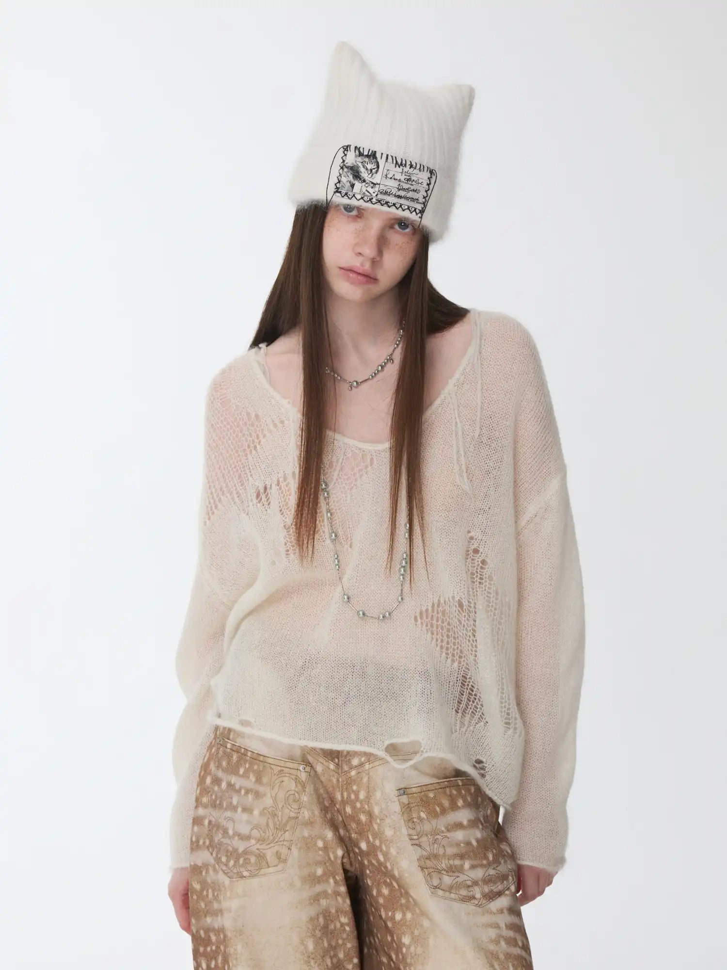 1Jinn Studio Star Cutout Knit Sweater | Canton Collective