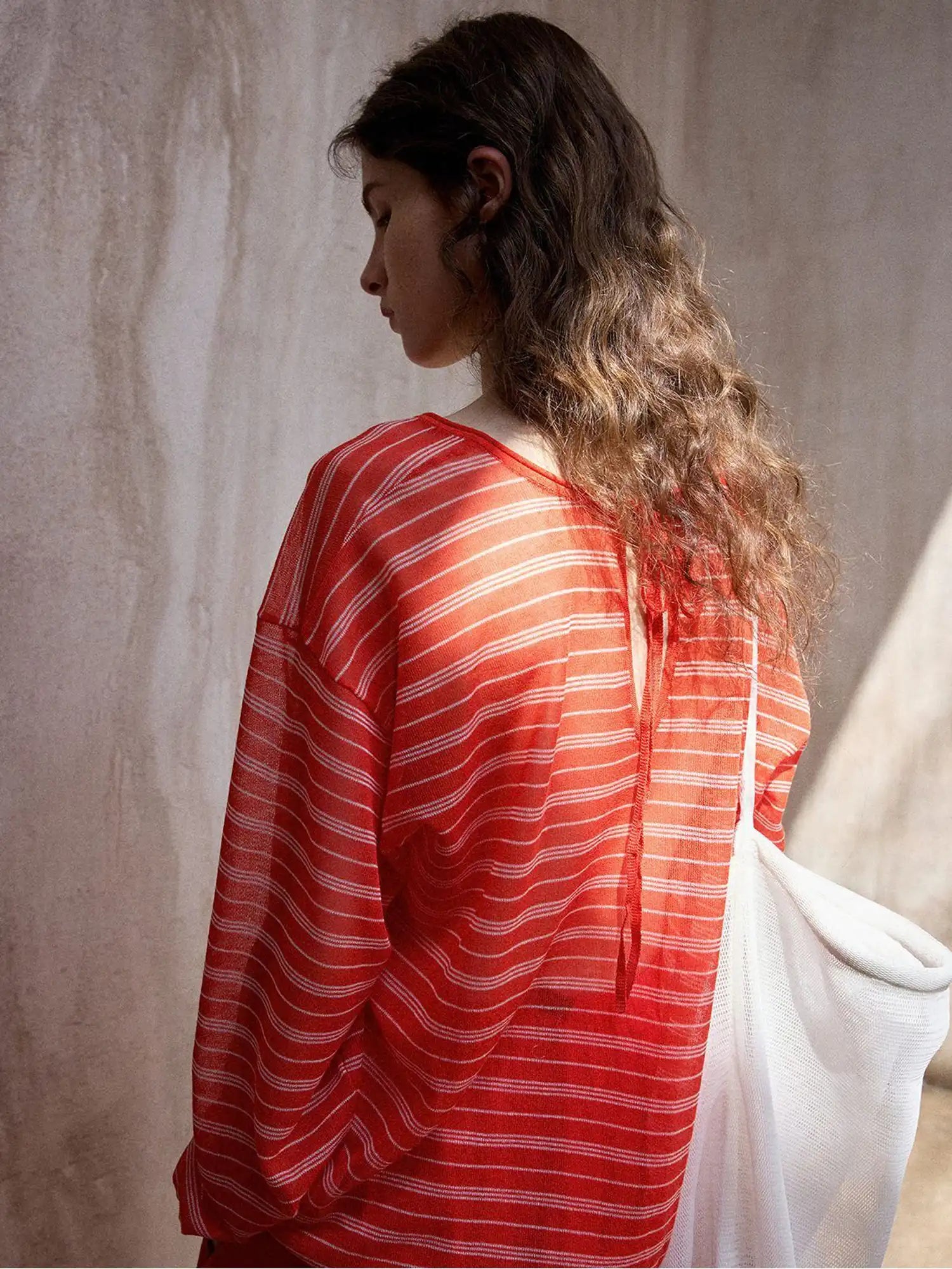 CantonCollective Design Striped V-Neck Long Sleeve Knit Top with Tie Back Detail | Canton Collective